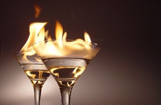 Alcoholic_drinks_sector_hit_by_Covid_19_in_Greece_drink_ouzo_flame_973387161