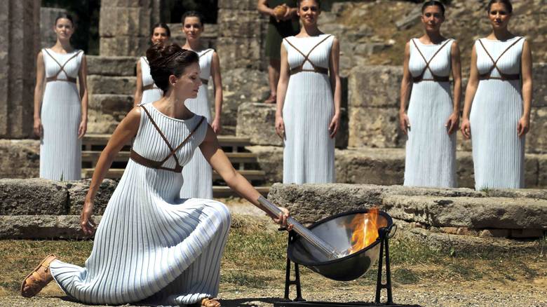 The Olympic Flame is lit by the High Priestess in Ancient Olympia